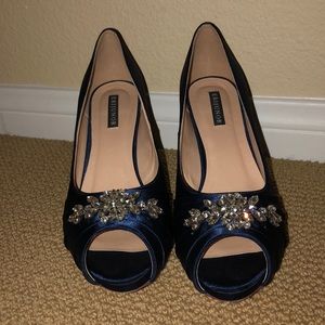 Satin blue peep toe pumps with rhinestones